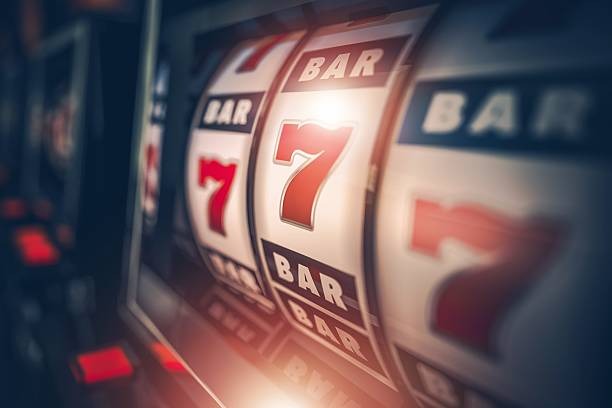 Live dealer table broadcast studio showing baccarat cards and professional dealer